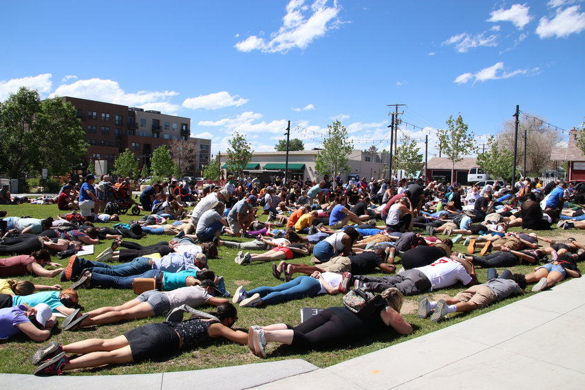 Crowds filled festival park in protest on June 7, laying down for nine minutes chanting “I can’t breathe.”